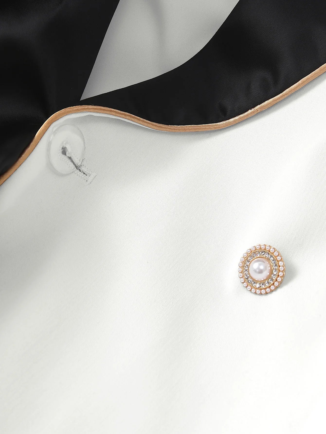 Elegant Asymmetrical White Blazer with Black Contrast Lapels