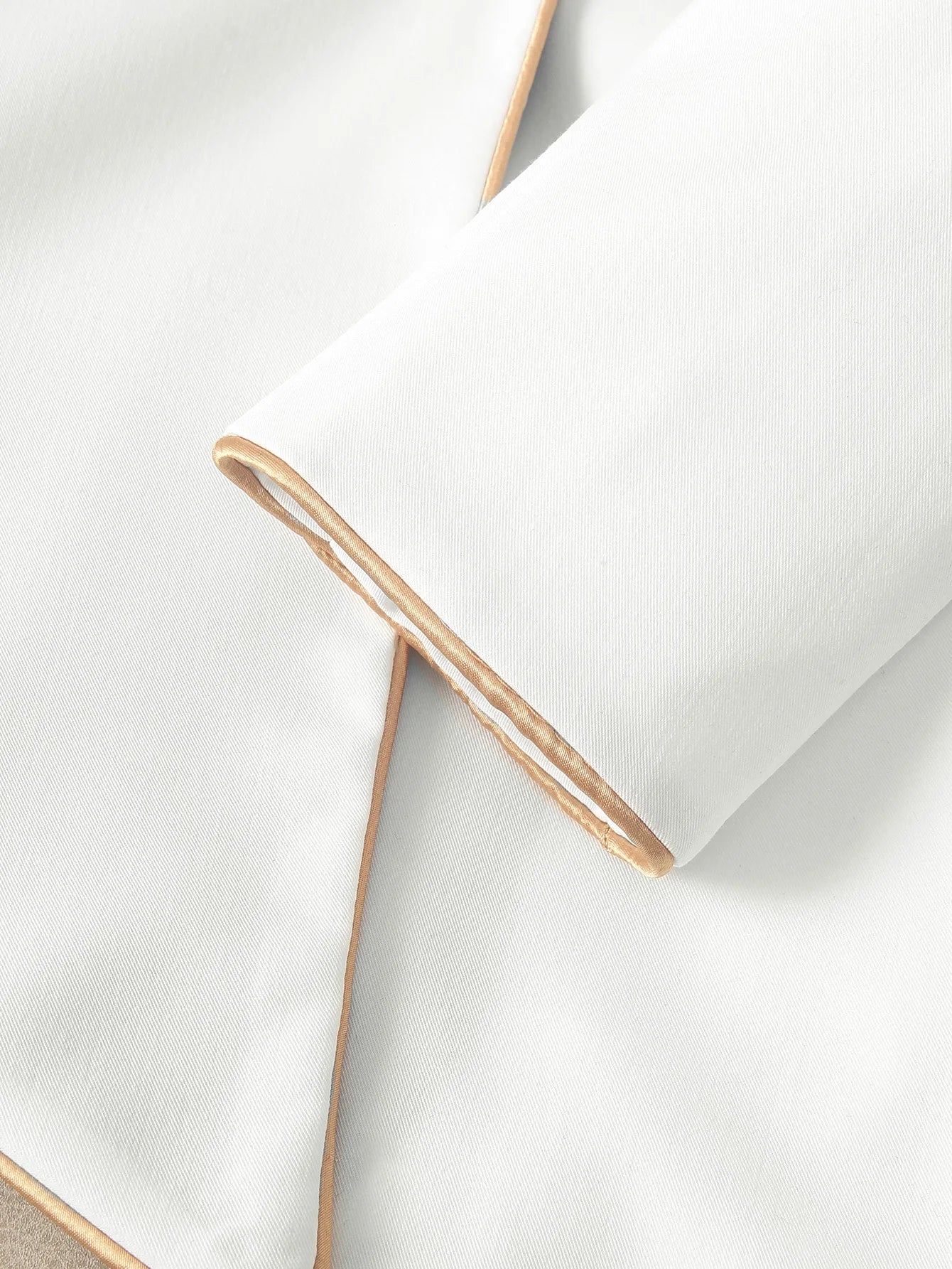Elegant Asymmetrical White Blazer with Black Contrast Lapels