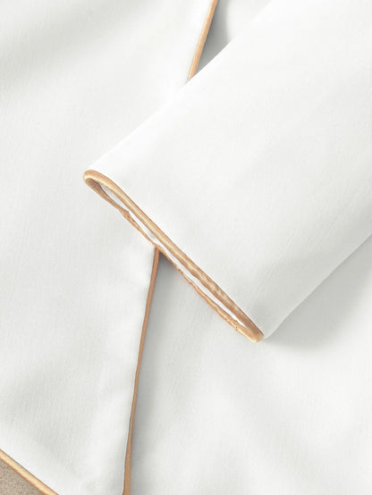 Elegant Asymmetrical White Blazer with Black Contrast Lapels